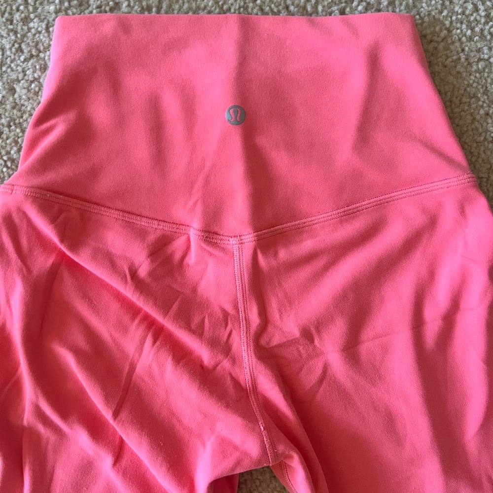 Pink lululemon leggings size 4